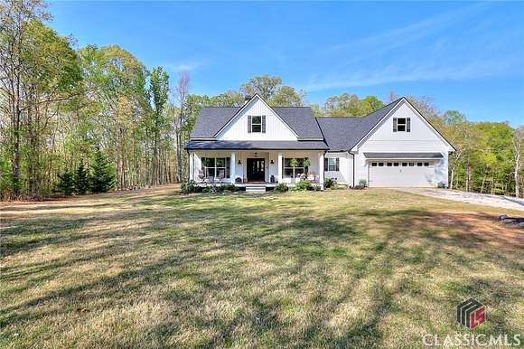 5 Acres of Residential Land with Home for Sale in Hull, Georgia