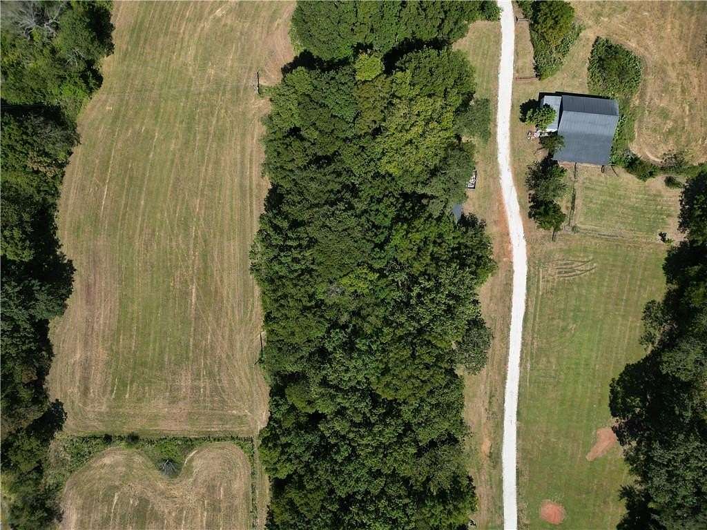 11.436 Acres of Land with Home for Sale in Prairie Grove, Arkansas