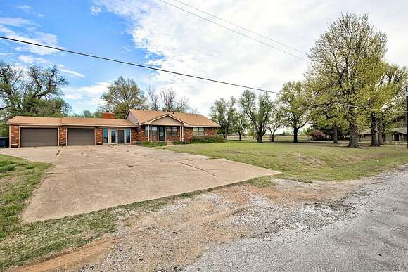 3.4 Acres of Residential Land with Home for Sale in Enid, Oklahoma