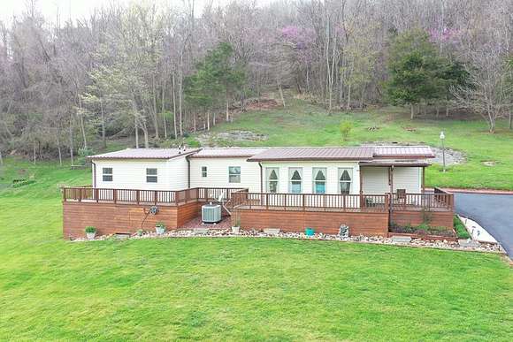 9.5 Acres of Residential Land with Home for Sale in Honaker, Virginia