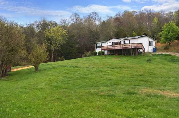 11.8 Acres of Land with Home for Sale in Kodak, Tennessee