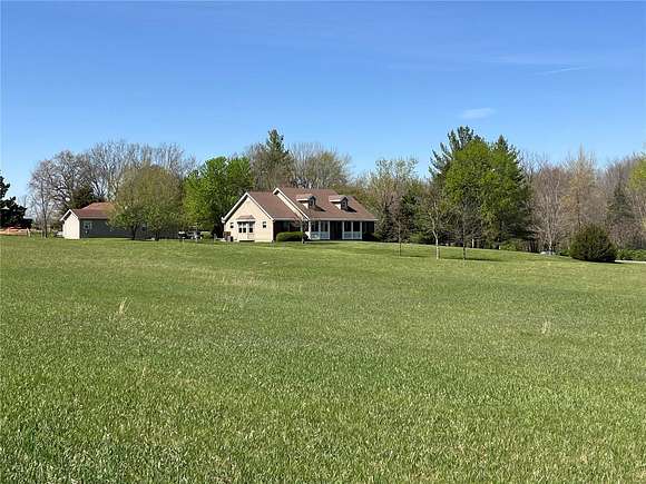 48 Acres of Land with Home for Sale in Hawk Point, Missouri