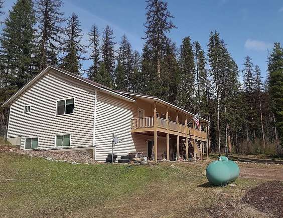 5.3 Acres of Residential Land with Home for Sale in Seeley Lake, Montana