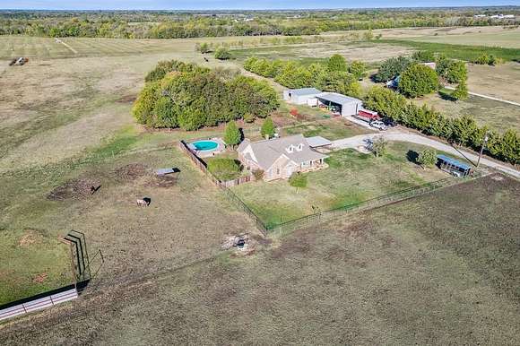 10 Acres of Residential Land with Home for Sale in Leonard, Texas