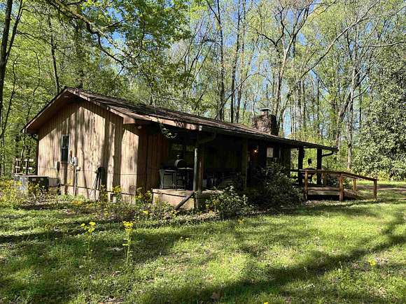 9.86 Acres of Land with Home for Sale in Millington, Tennessee