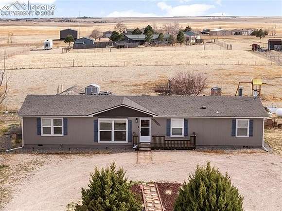 2.5 Acres of Residential Land with Home for Sale in Peyton, Colorado
