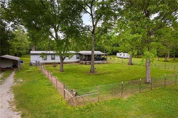 4.7 Acres of Residential Land with Home for Sale in Lecompte, Louisiana