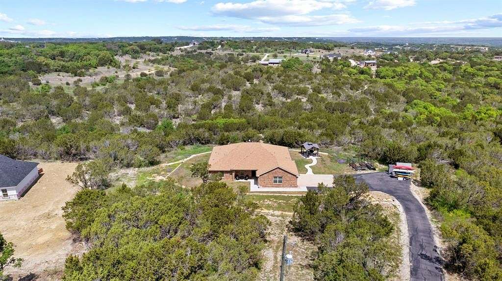 2 Acres of Residential Land with Home for Sale in Bluff Dale, Texas