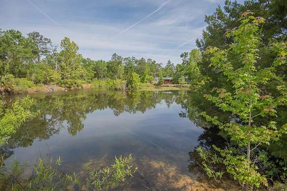 10.7 Acres of Recreational Land with Home for Sale in Steinhatchee, Florida