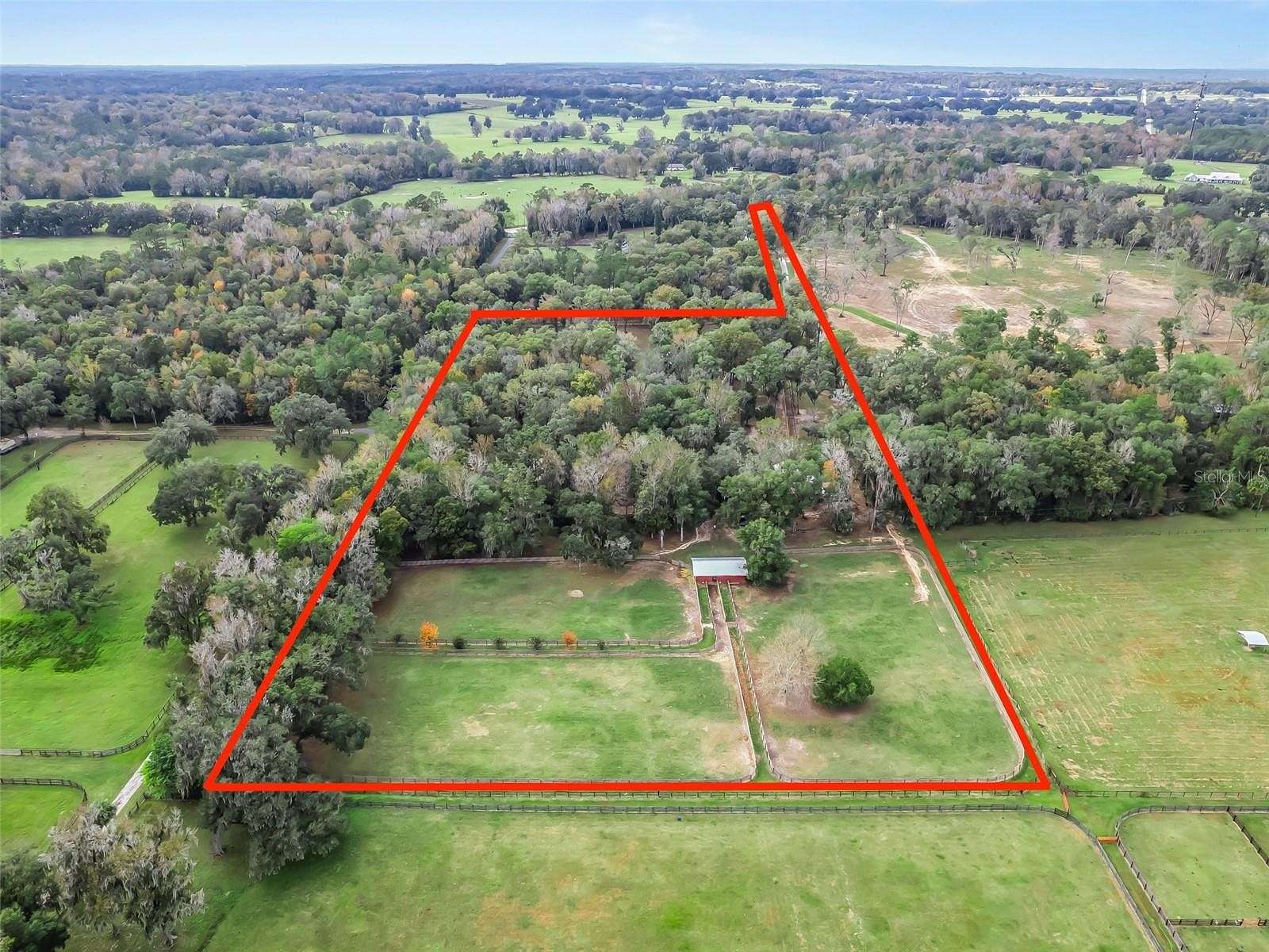 13.4 Acres of Land with Home for Sale in Reddick, Florida