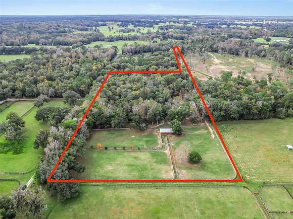 13.4 Acres of Land with Home for Sale in Reddick, Florida