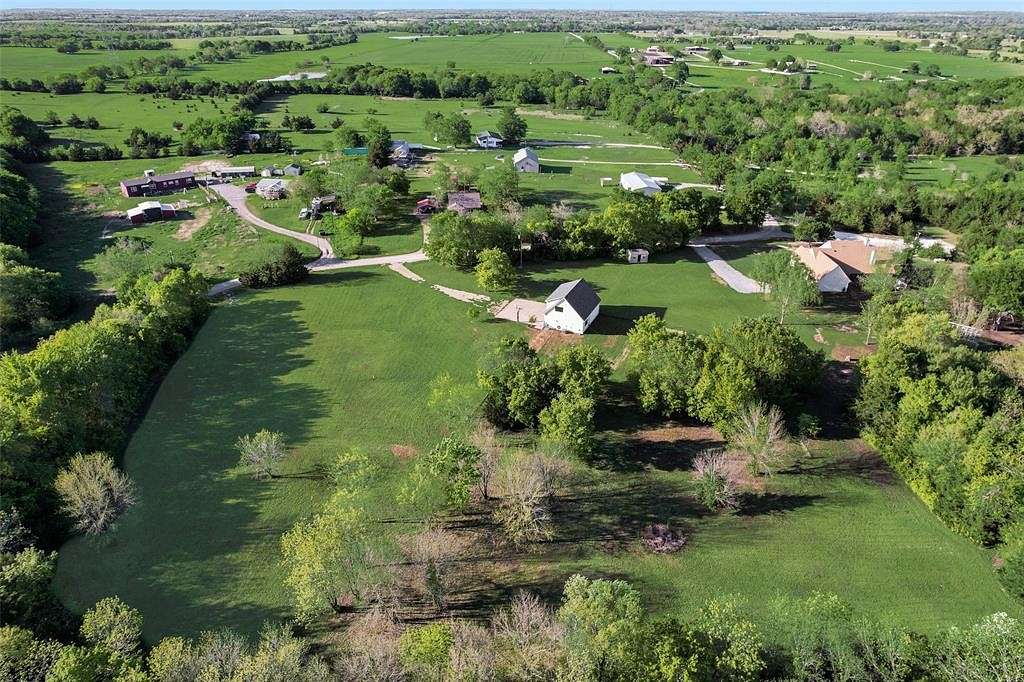5.6 Acres of Residential Land with Home for Sale in Whitewright, Texas