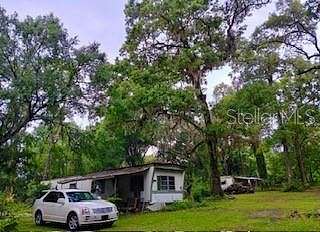 2 Acres of Residential Land with Home for Sale in Reddick, Florida