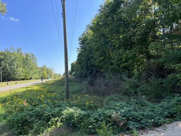 2.3 Acres of Residential Land with Home for Sale in Scottville, Michigan