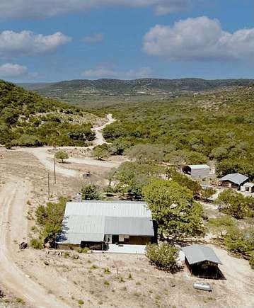 109 Acres of Recreational Land with Home for Sale in Tarpley, Texas