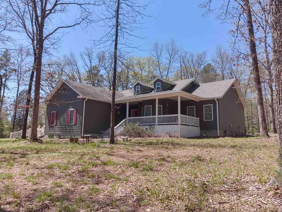 3.9 Acres of Residential Land with Home for Sale in Quitman, Arkansas
