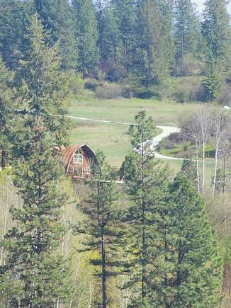 30 Acres of Land with Home for Sale in Kettle Falls, Washington