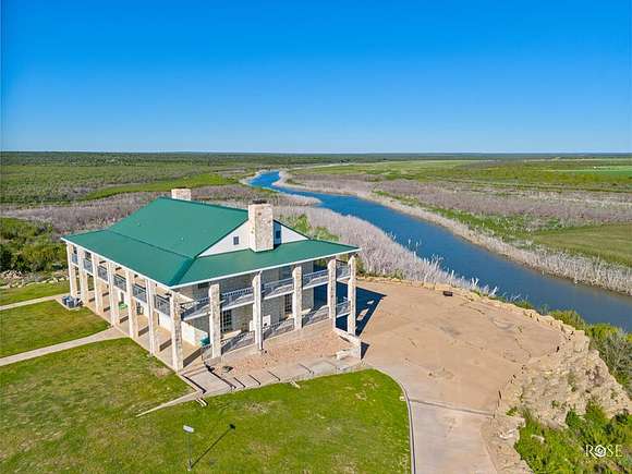 9.5 Acres of Residential Land with Home for Sale in Paint Rock, Texas