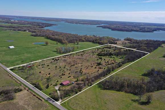 27 Acres of Recreational Land with Home for Auction in Clifton Hill, Missouri