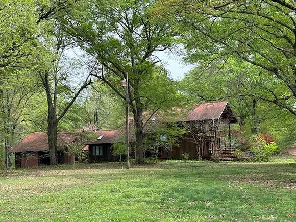 6.6 Acres of Residential Land with Home for Sale in Senatobia, Mississippi