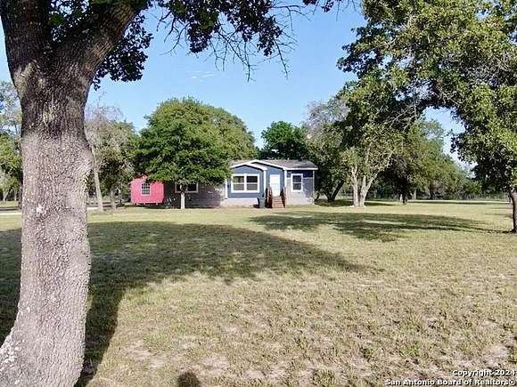 5.8 Acres of Residential Land with Home for Sale in Natalia, Texas