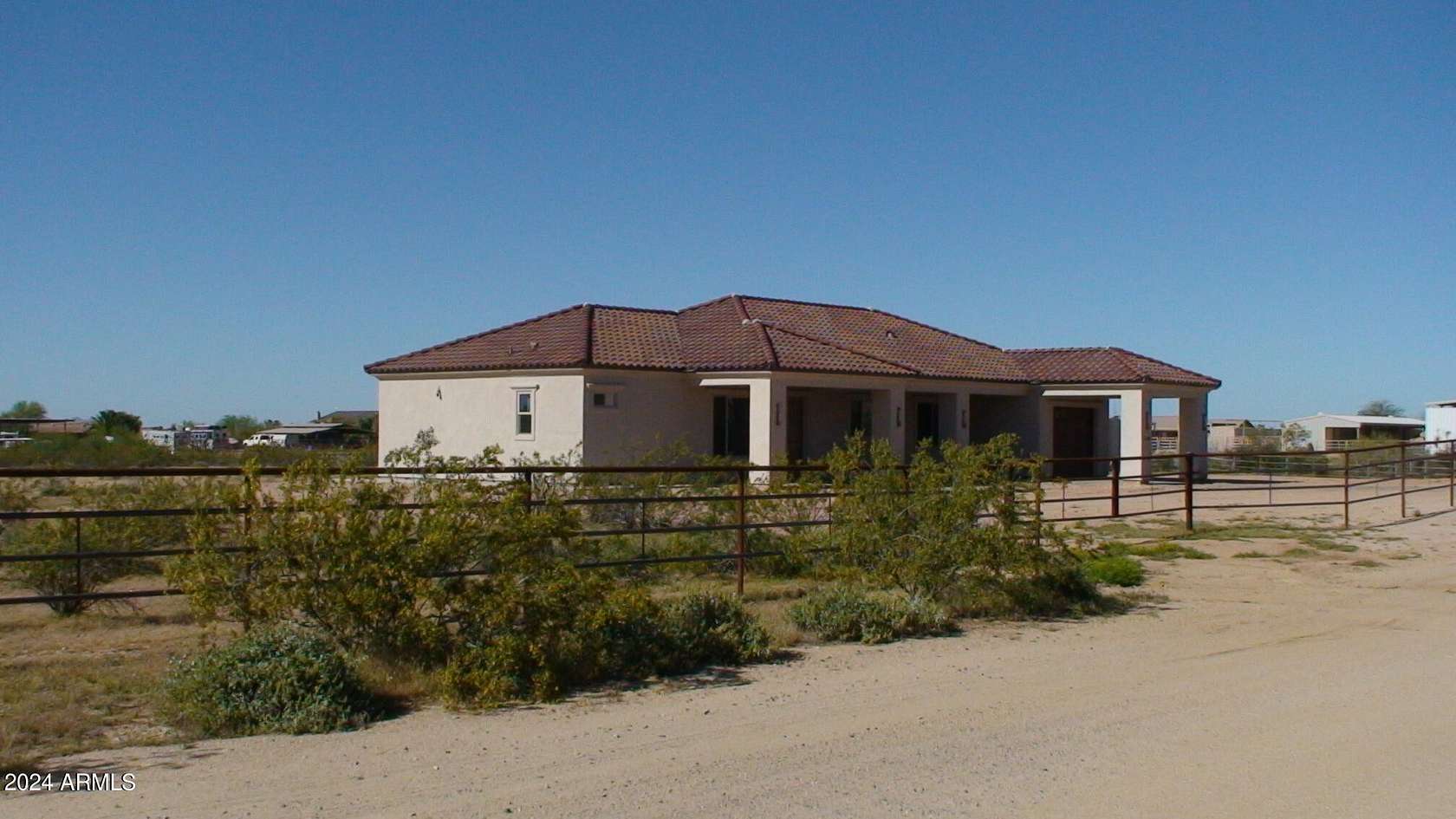 2.3 Acres of Residential Land with Home for Sale in Wittmann, Arizona