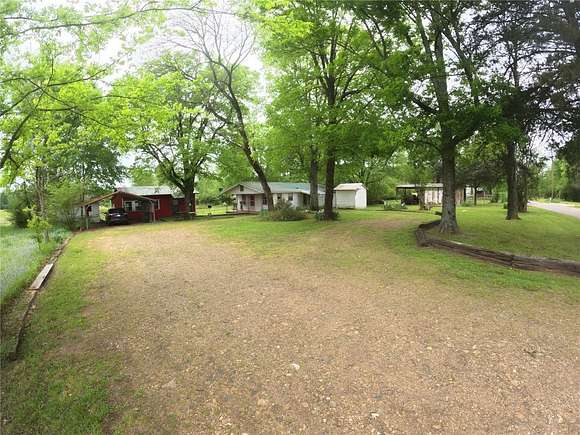 10 Acres of Residential Land with Home for Sale in Broken Bow, Oklahoma