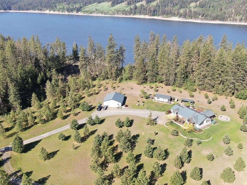 20 Acres of Recreational Land with Home for Sale in Hunters, Washington