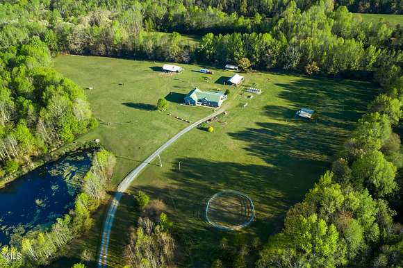 21.1 Acres of Agricultural Land with Home for Sale in Liberty, North Carolina
