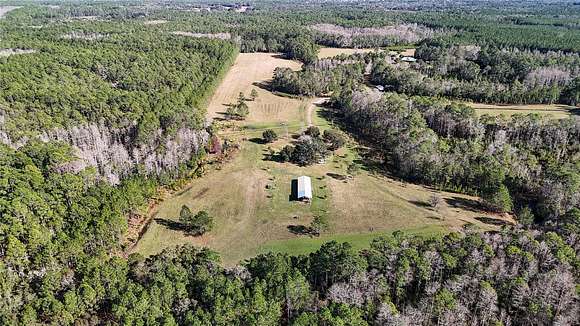 40 Acres of Recreational Land with Home for Sale in Bronson, Florida