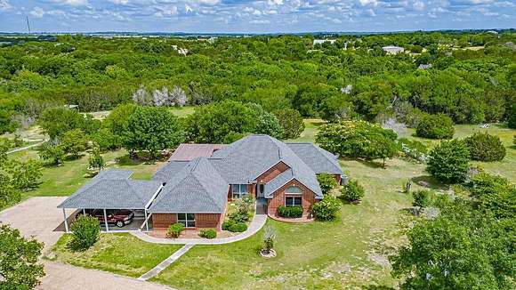 11 Acres of Land with Home for Sale in Granbury, Texas