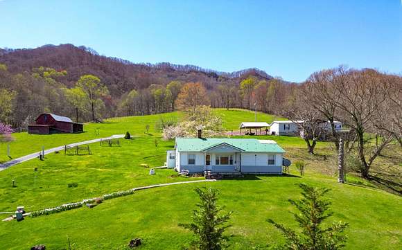 16 Acres of Land with Home for Auction in Roan Mountain, Tennessee