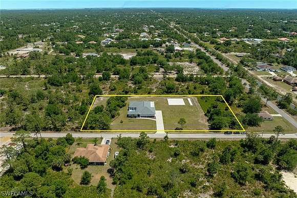 2 Acres of Residential Land with Home for Sale in Lehigh Acres, Florida