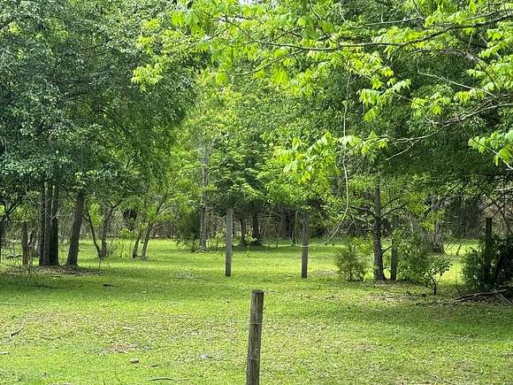 6.4 Acres of Residential Land with Home for Sale in Diboll, Texas