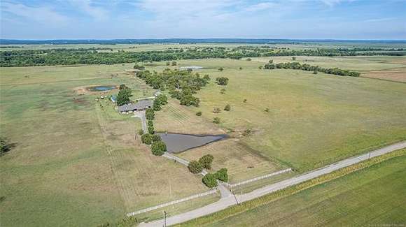 226 Acres of Land with Home for Sale in Okmulgee, Oklahoma