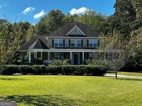 5.2 Acres of Land with Home for Sale in Byron, Georgia