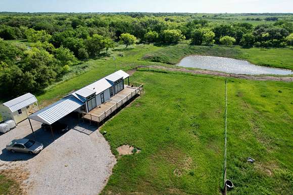 14.6 Acres of Land with Home for Sale in Carbon, Texas