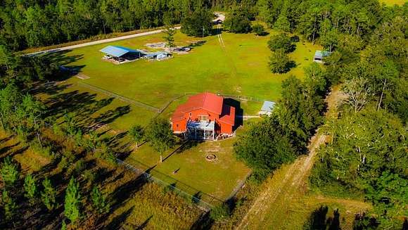 8.5 Acres of Residential Land with Home for Sale in Wewahitchka, Florida