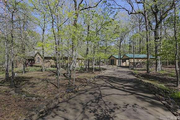 4.9 Acres of Residential Land with Home for Sale in Roland, Arkansas