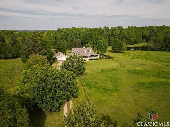 13.9 Acres of Land with Home for Sale in Colbert, Georgia