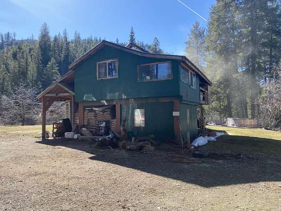19.3 Acres of Land with Home for Sale in Loon Lake, Washington