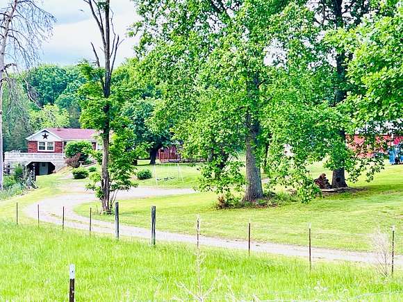 24.3 Acres of Recreational Land with Home for Auction in Jamestown, Kentucky
