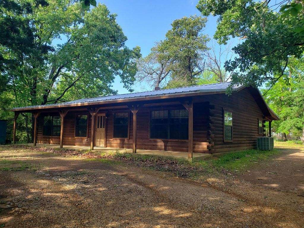 11.73 Acres of Land with Home for Sale in Nacogdoches, Texas