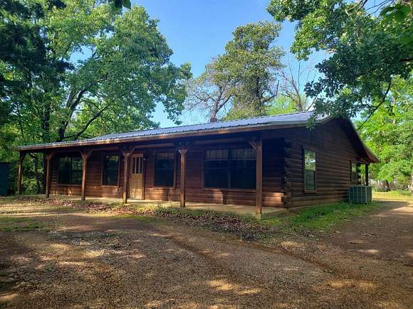 11.7 Acres of Land with Home for Sale in Nacogdoches, Texas