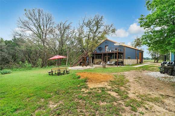 31.4 Acres of Recreational Land with Home for Sale in Cleburne, Texas