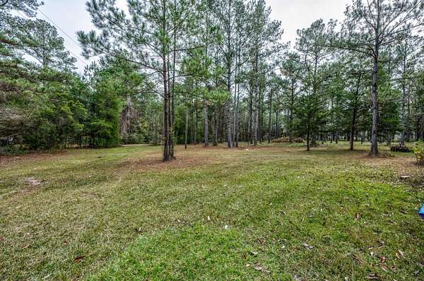 13.8 Acres of Land with Home for Sale in Freeport, Florida
