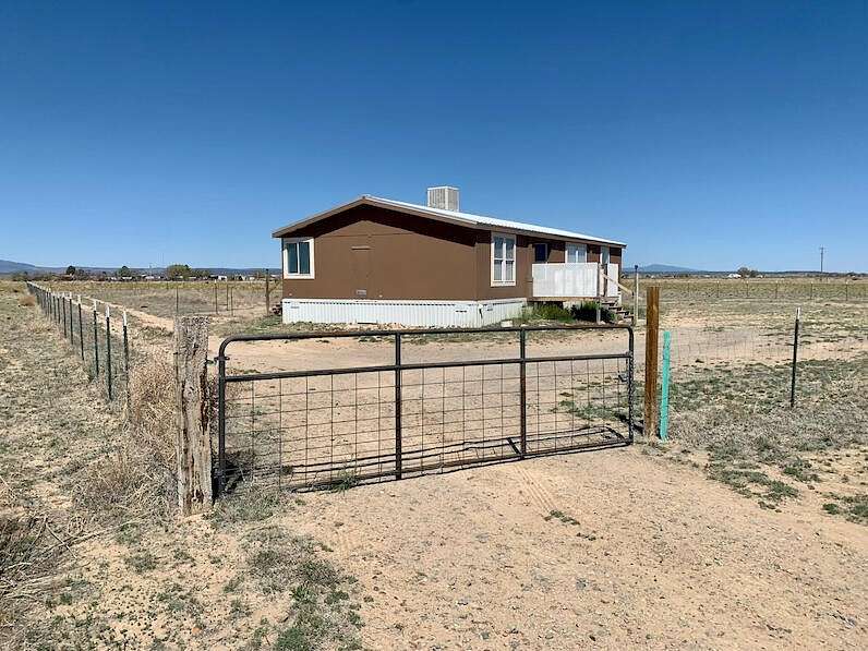 5 Acres of Residential Land with Home for Sale in McIntosh, New Mexico