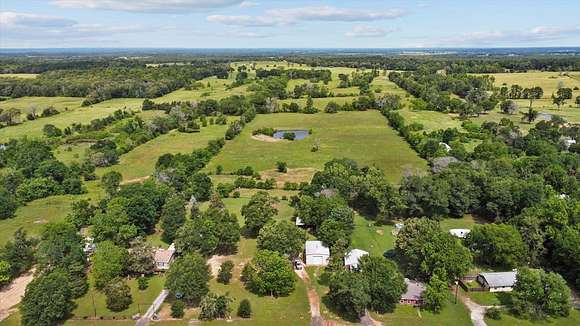 35 Acres of Agricultural Land with Home for Sale in Crockett, Texas