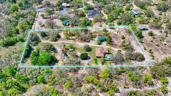 4 Acres of Residential Land with Home for Sale in Weeki Wachee, Florida