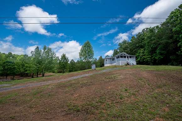 5.2 Acres of Residential Land with Home for Sale in Calhoun, Tennessee